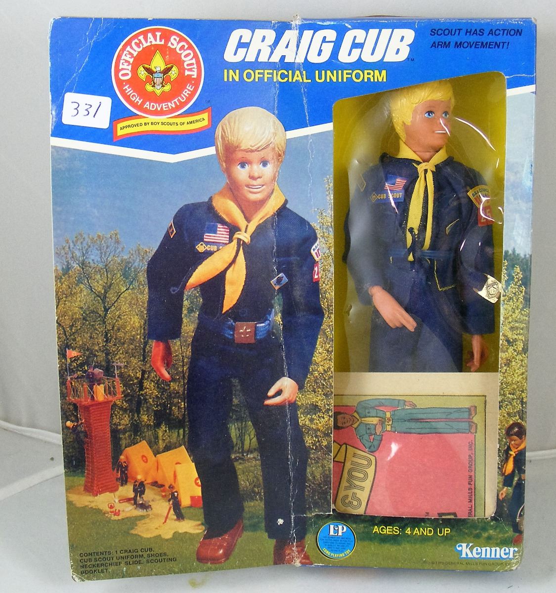 Boy deals scout doll